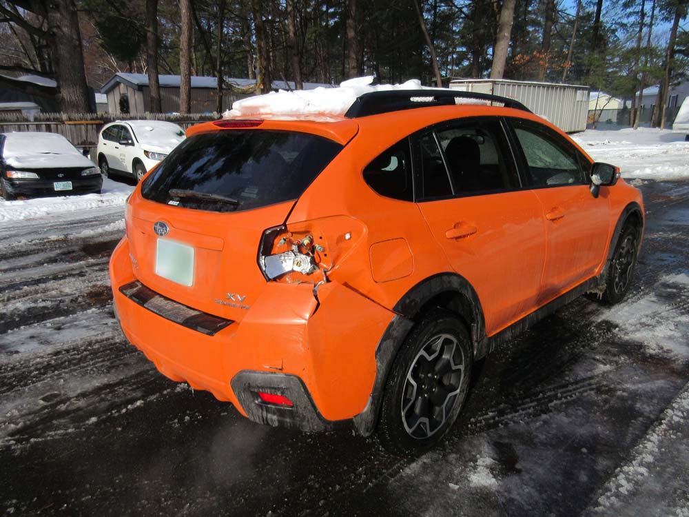 Damaged Subaru before repair